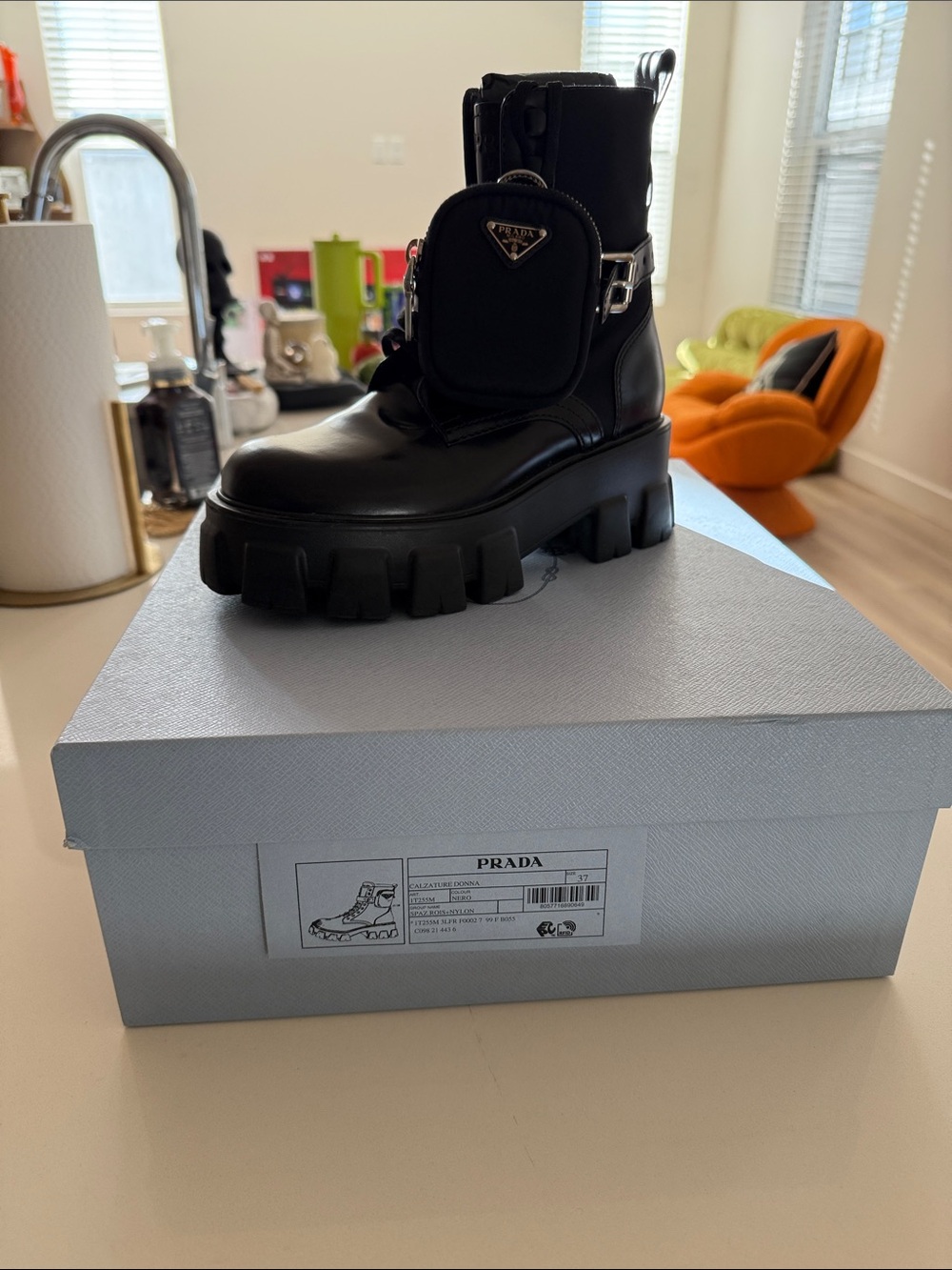 Prada Black MONOLITH
Leather Lug Sole Lace-Up Combat Boot with Detachable Pouch